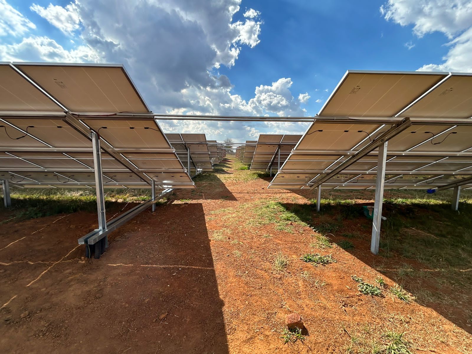 Between two rows of mounted solar panels